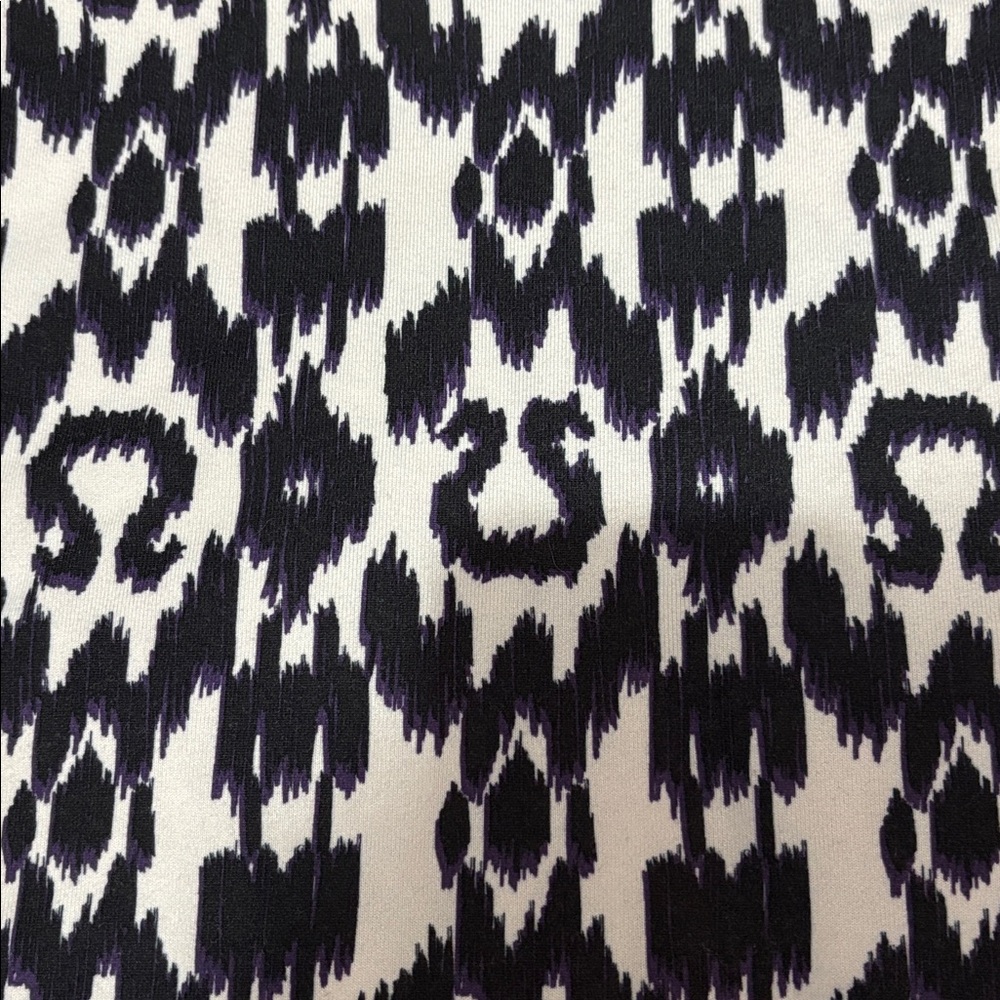 Lululemon tank top. No tag. Measures a size 4. White,black and purple. - Picture 5 of 7